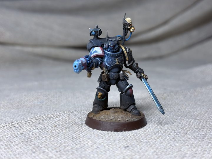 A finished miniature on its round base